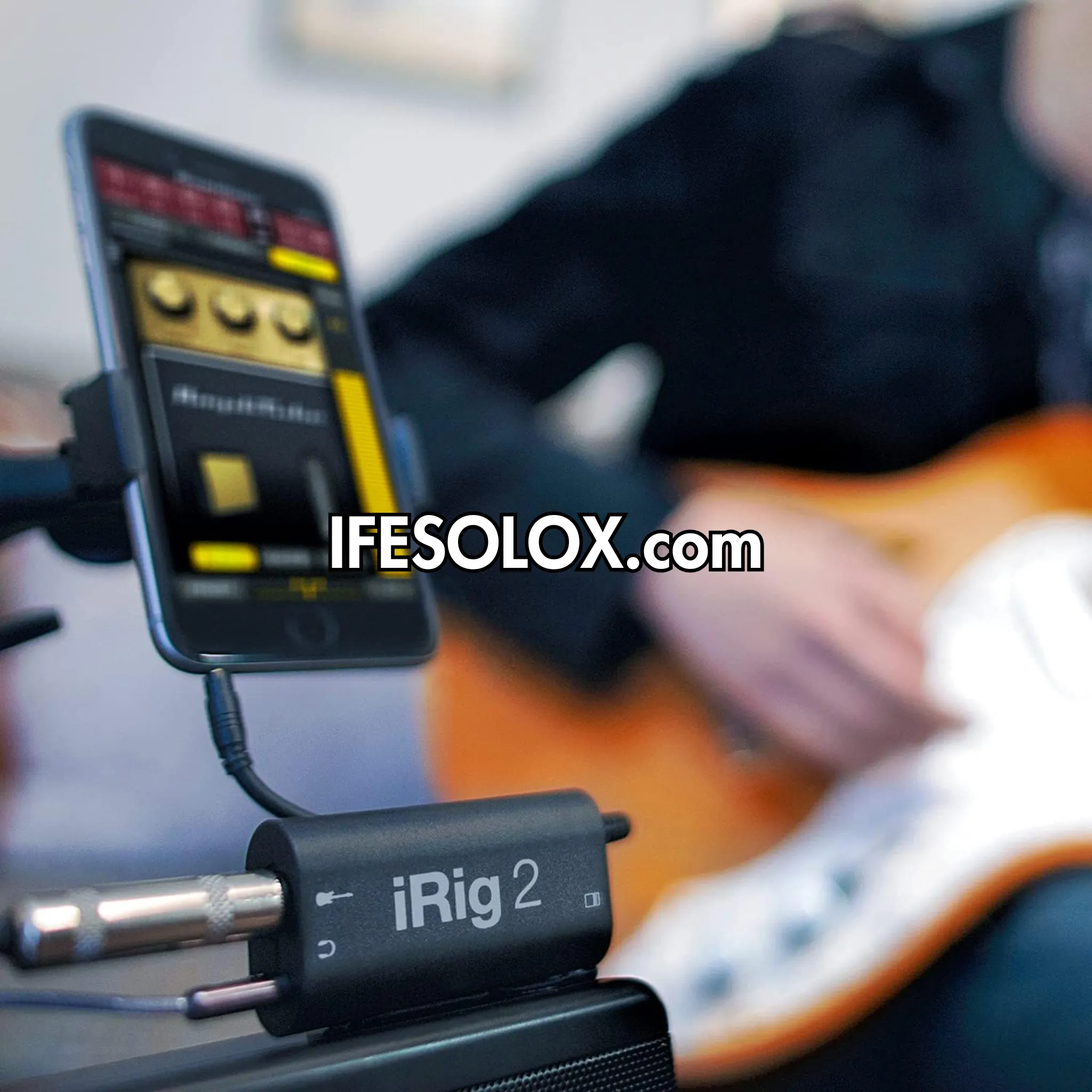 iRig 2 Guitar Audio Interface for iPhones, Androids and PCs with 1/4 inch Output - Brand New